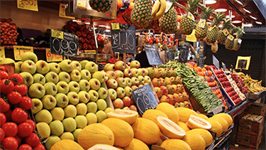Market aisle with fresh fruit.