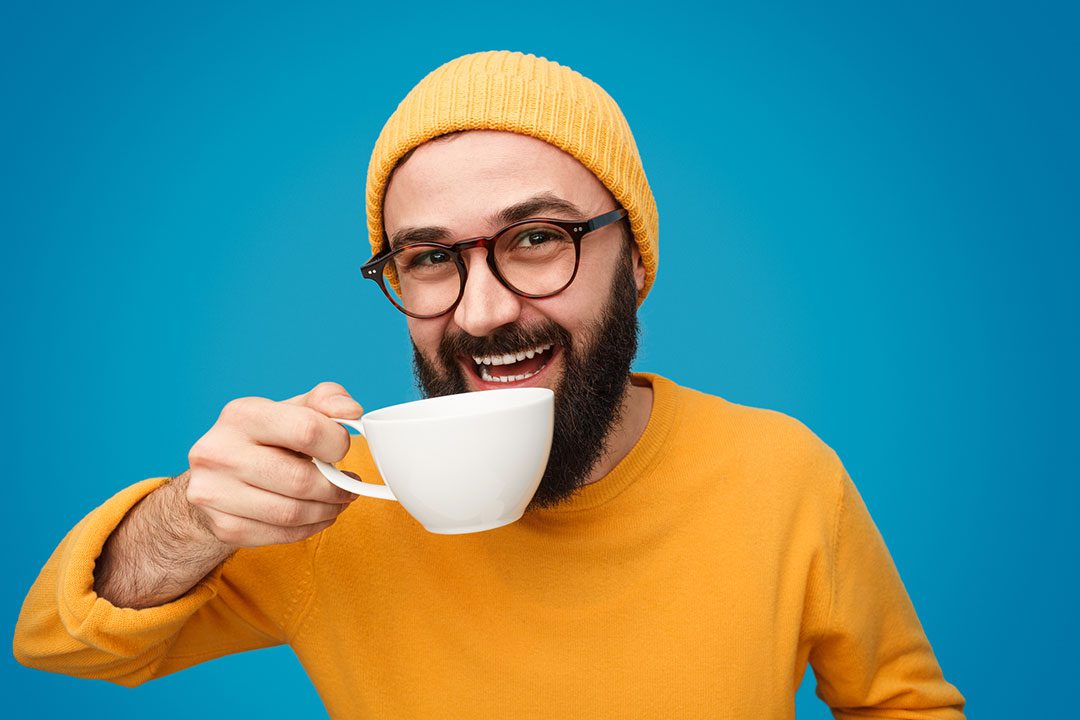 Happy Guy Drinking Alternative Coffee